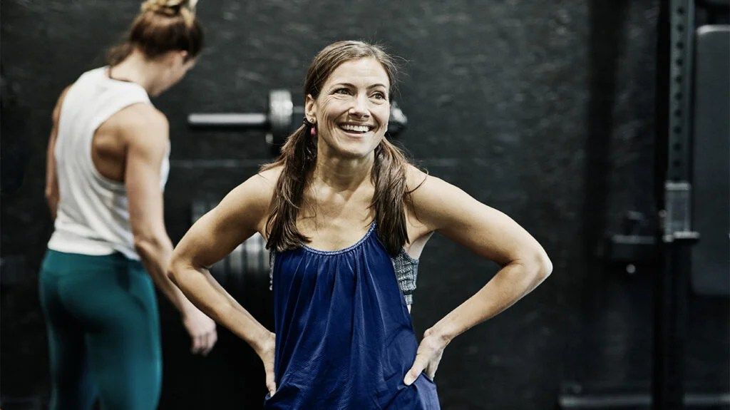 Adult athlete preparing for a coached workout